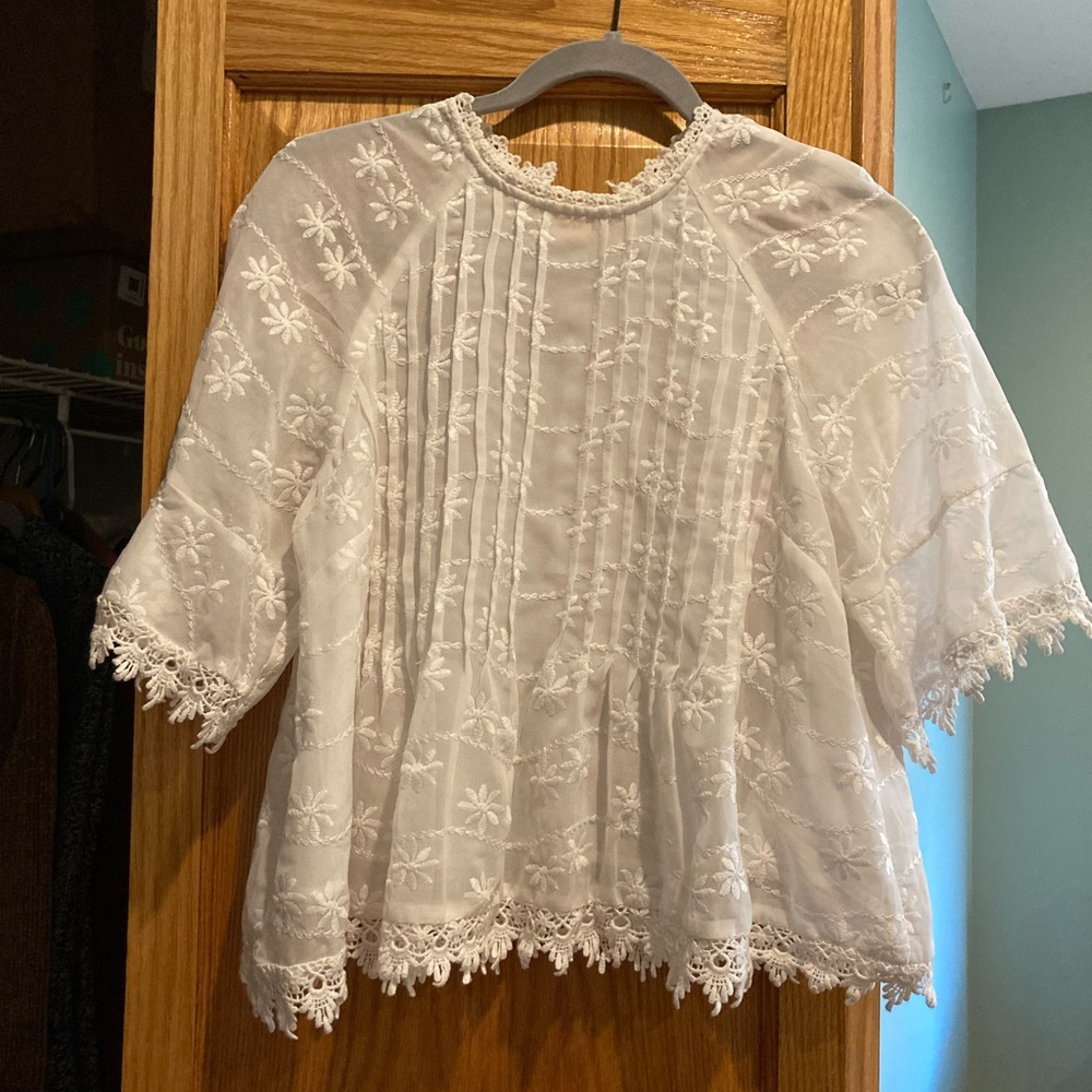 Beautiful embroidered white top.
